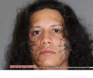 Deltona man adds to spider tattoo motif...
